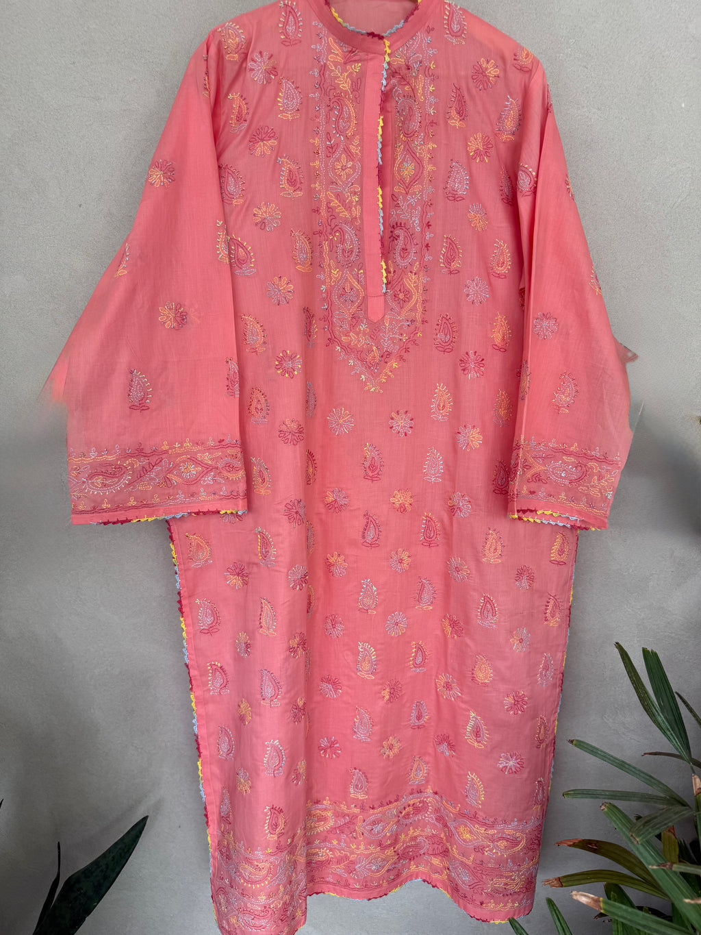 Coral with multi coloured embroidery