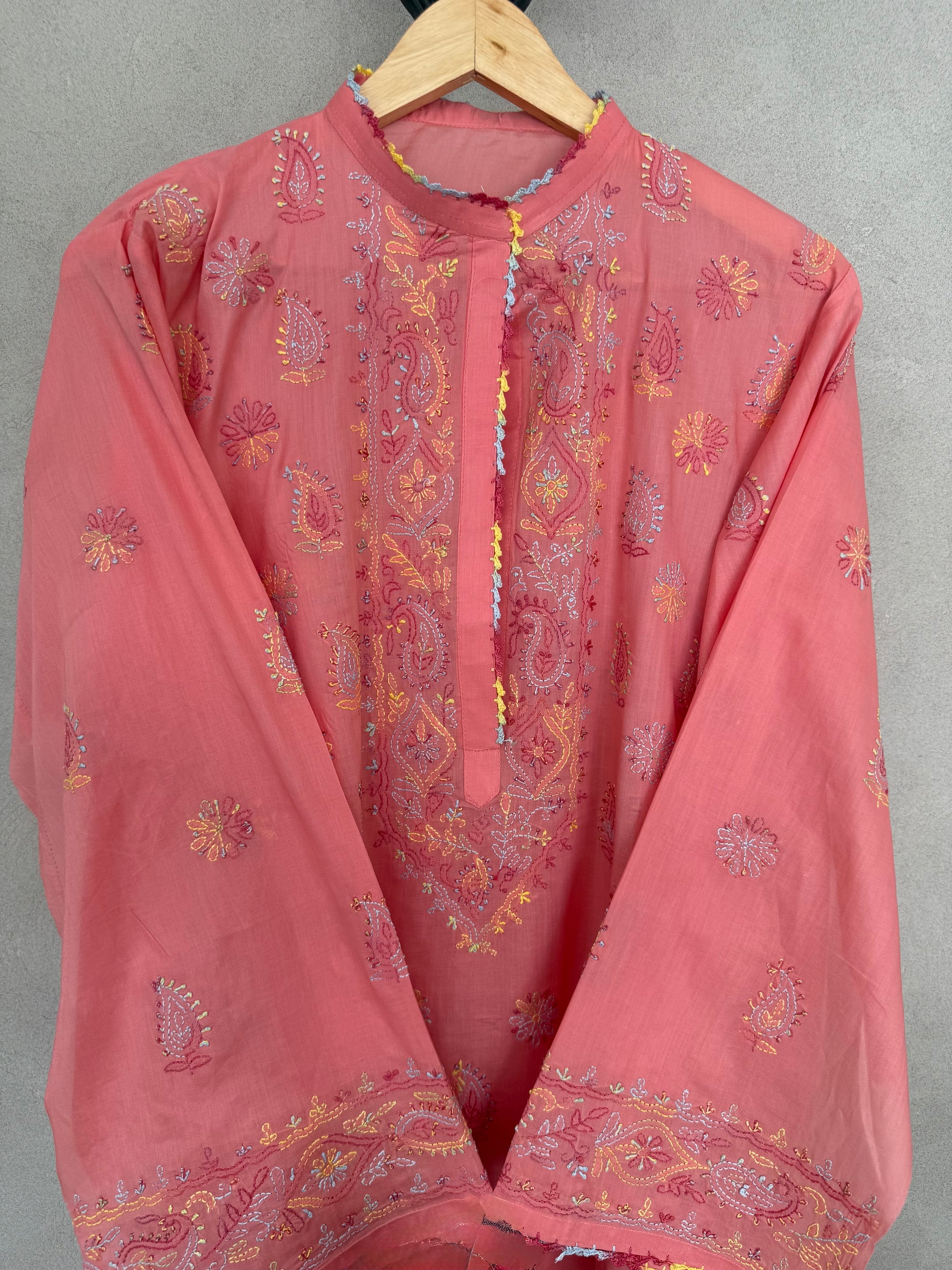 Coral with multi coloured embroidery
